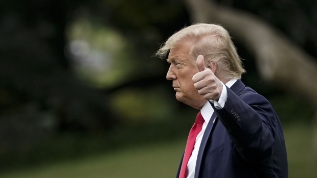 WASHINGTON, DC - JULY 24: U.S. President Donald Trump gives a thumbs up as he walks toward Marine One on the South Lawn of the White House on July 24, 2020 in Washington, DC. President Trump is spending the weekend at his Bedminster, New Jersey residence. (Photo by Drew Angerer/Getty Images)