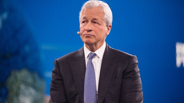 Jamie Dimon, chief executive officer of JPMorgan Chase & Co., listens during the Bloomberg Global Business Forum in New York, U.S., on Wednesday, Sept. 25, 2019. The third annual Forum brings together important global leaders from the public and private sectors to address the threats from global warming to economic prosperity and examine the opportunities for solutions. Photographer: Tiffany Hagler-Geard/Bloomberg