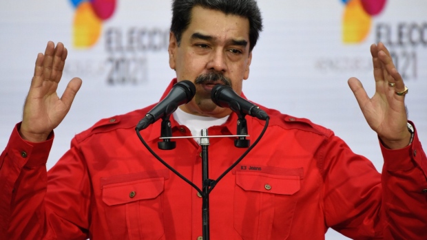 Nicolas Maduro speaks to members of the media after casting a ballot at a polling station during regional elections in Caracas, on Nov. 21. Photographer: Carolina Cabral/Bloomberg