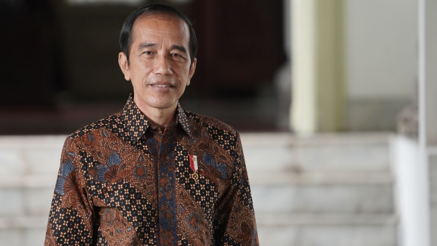 Joko Widodo, Indonesia's president, at Presidential Palace in Jakarta, Indonesia, on Wednesday, April 7, 2021. President Widodo is backing a push to expand Bank Indonesia’s mandate to include support for the economy, throwing his public support behind a legislative move that some analysts see as risking the central bank’s independence.