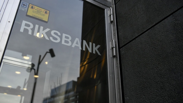 A sign on an entrance reads Riksbank at the headquarters of the Sveriges Riksbank headquarters in Stockholm, Sweden, on Thursday, Dec. 19, 2019. Sweden's central bank ended half a decade of subzero easing in a move that will provide relief to the finance industry and a test case for global counterparts experimenting with negative borrowing costs. Photographer: Mikael Sjoberg/Bloomberg