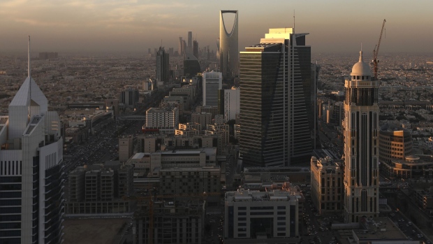 The Kingdom Tower, center rear, stands as automobile traffic moves along the King Fahd highway, left and Olaya Street, right, in Riyadh, Saudi Arabia, on Thursday, Dec. 1, 2016. Saudi Arabia is working to reduce the Middle East’s biggest economy’s reliance on oil, which provides three-quarters of government revenue, as part of a plan for the biggest economic shakeup since the country’s founding.