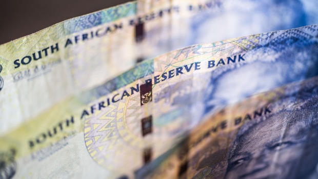 South African 100 rand banknotes stand in this arranged photograph in Pretoria, South Africa, on Wednesday, Aug. 14, 2019. The rand ended a tumultuous week on a positive note, gaining against the dollar for a second day and heading for its first weekly advance in four as technical indicators suggested recent declines are overdone. Photographer: Waldo Swiegers/Bloomberg