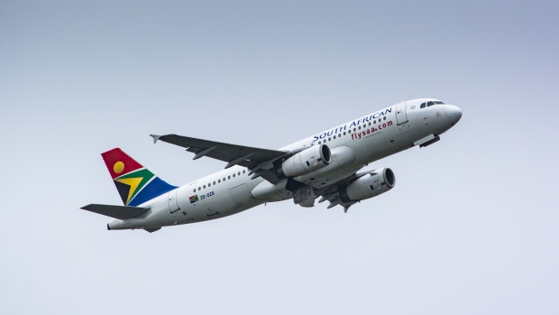 Passenger jets, operated by South African Airlines (SAA), taxi at O.R. Tambo International Airport in Johannesburg, South Africa, on Friday, Jan. 24, 2020. South African Airways said “time is of the essence” for the government to provide a pledged cash injection if the loss-making national carrier is to continue flying. Photographer: Waldo Swiegers/Bloomberg