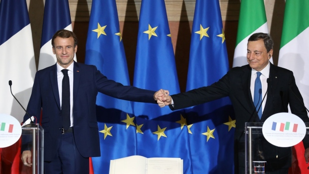 Mario Draghi, Italy's prime minister, right, and Emmanuel Macron, France's president, attend a news conference at Villa Madama in Rome, Italy, on Friday, Nov. 26, 2021. Italy and France have signed a cooperation deal on the space sector, Draghi said in joint briefing with Macron on Friday in Rome.