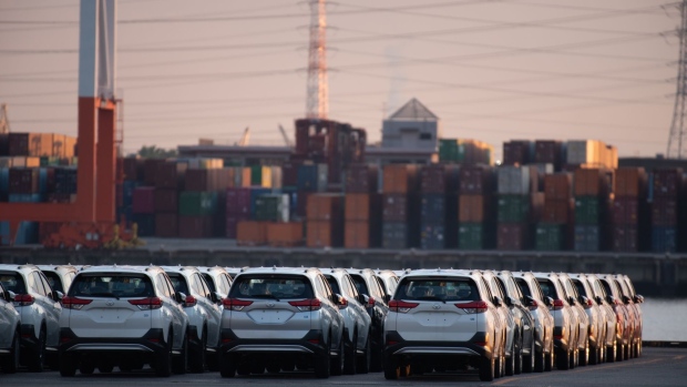 Toyota Motor Corp. Rush vehicles bound for shipment sit at the Nagoya Port in Tokai, Aichi Prefecture, Japan, on Wednesday, June 12, 2019. Toyota brought forward an electrified-vehicle sales target by five years as demand picks up. The company expects to have annual sales of 5.5 million of such vehicles globally in 2025, compared with a previous target of 2030.