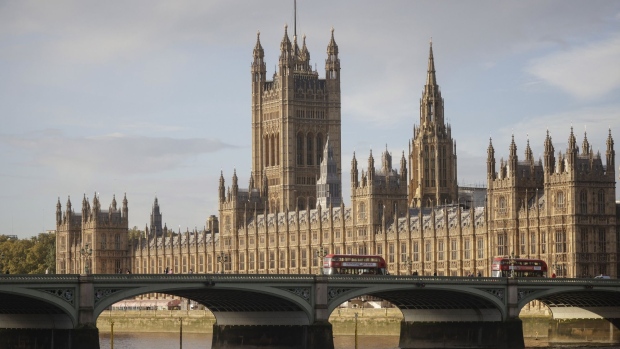 The Houses of Parliament and Westminster Bridge in London, U.K., on Monday, Oct. 25, 2021. Frances Haugen, a former Facebook product manager, is due to give evidence to U.K. lawmakers at a draft online safety bill committee hearing. Photographer: Jason Alden/Bloomberg