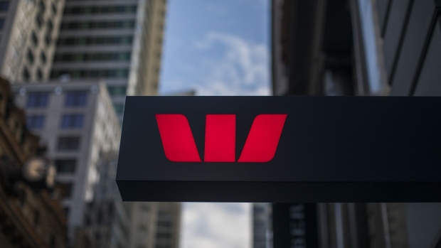 The Westpac Banking Corp. (Westpac) logo is displayed on a sign outside a branch in Sydney, Australia, on Tuesday, Aug. 18, 2020. Westpac scrapped its first-half dividend, citing the desire to maintain a strong balance sheet in an uncertain operating environment. The lender had previously deferred any decision on a payout during the height of the first coronavirus outbreak. Photographer: Brent Lewin/Bloomberg