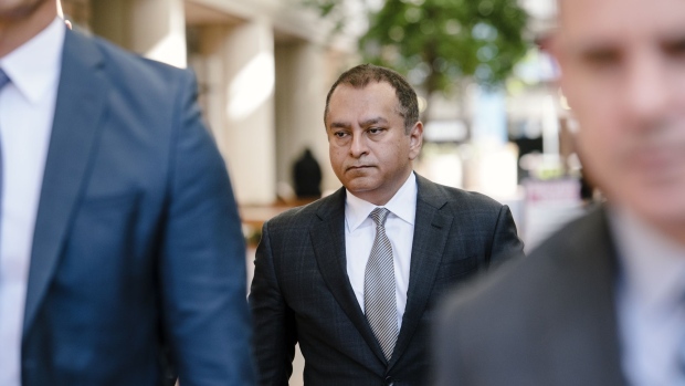 Sunny Balwani, former president and chief operating officer of Theranos Inc., leaves federal court in San Jose, California, U.S., on Wednesday, Oct. 2, 2019. The defunct blood-testing startup which was once valued at as much as $9 billion unraveled amid what prosecutors describe as a massive scheme masterminded by founder Elizabeth Holmes and Balwani to mislead investors, doctors and patients.
