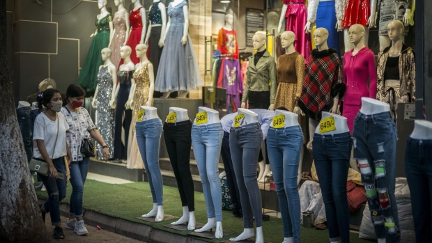 Jeans are displayed on mannequins outside a store during the Diwali festival in New Delhi, India, on Wednesday, Nov. 3, 2021. Businesses are expecting sales during Diwali -- the Hindu festival of lights -- will pick up to levels seen before the pandemic struck early last year, in part because financiers, sitting on a huge pile of excess cash, are eager to lend with outstanding consumer durable loans already at its highest in more than three years. Photographer: Anindito Mukherjee/Bloomberg