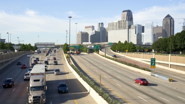 Traffic moves along U.S. Highway 75, near the Hall St. overpass, during the morning commute in Dallas, Texas, U.S., on Wednesday, May 27, 2020. Texas Governor Greg Abbott allowed bars—along with rodeos, bowling alleys and bingo halls—to open their doors at reduced capacity in the second phase of the state’s plan to restart the economy after shutting down in early April to slow the coronavirus.