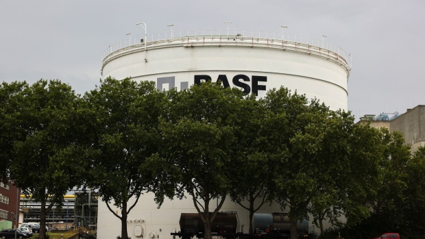 The BASF SE logo sits on a storage silo at the company's chemical plant on the River Rhine in Ludwigshafen, Germany, on Thursday, Aug. 13, 2020. Around 30% of Germany’s coal, iron ore and natural gas is transported along the river, where factories are set up to take deliveries for just-in-time manufacturing.