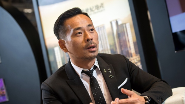 Alvin Chau, founder and chairman of Suncity Group Holdings Ltd., speaks during an interview during the Macau Gaming Show (MGS) at the Venetian Hotel in Macau, China, on Tuesday, Nov. 14, 2017. Suncity, the biggest junket group in Macau, is rewarding its high rollers with travel packages to attend the Kennards Hire Rally car race in Australia and a limited-edition Christophe Claret watch -- and it's reaping dividends.