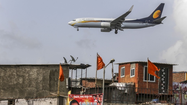 A Jet Airways India Ltd. aircraft prepares to land at Chhatrapati Shivaji International Airport in Mumbai, India, on Monday, July 10, 2017. India, which was the world’s fastest growing aviation market last year, is crucial for planemakers like Boeing Co. and Airbus SE, as airlines see increased demand from the rising middle class.