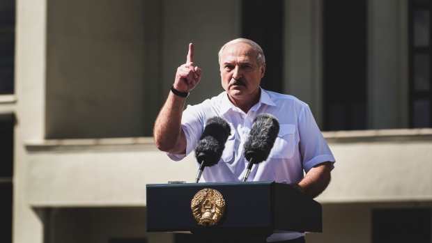 Alexander Lukashenko, Belarus’s president, gestures while giving a speech during a rally of his supporters in Independence Square in Minsk, Belarus, on Sunday, Aug. 16, 2020. Hundreds of thousands of people joined peaceful rallies in the capital, Minsk, and in cities across the country Sunday calling for President Alexander Lukashenko’s resignation and the release of detainees.