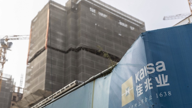 Kaisa Group Holdings Ltd.'s Future City development under construction in Shanghai, China, on Tuesday, Nov. 30, 2021. The newfound stability in Chinese dollar bonds will be tested this week as Kaisa Group announces whether creditors agreed to swap $400 million of dollar notes in a move designed to avert default.
