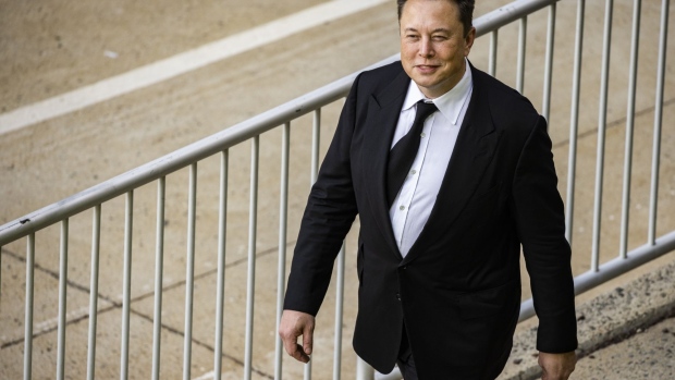 Elon Musk, chief executive officer of Tesla Inc., departs from court for the SolarCity trial in Wilmington, Delaware, U.S., on Monday, July 12, 2021. Musk was cool but combative as he testified in a Delaware courtroom that Tesla Inc.'s more than $2 billion acquisition of SolarCity in 2016 wasn't a bailout of the struggling solar provider.