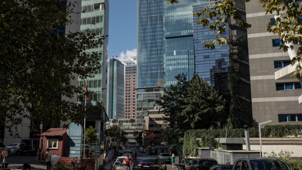 Commercial office buildings stand on a street in the Levent district of Istanbul, Turkey, on Wednesday, Sept. 16, 2020. Turkish bank stocks, hardest hit by a selloff of Istanbul equities from foreigners, are trading at a record discount to local industrial sectors. Photographer: Nicole Tung/Bloomberg