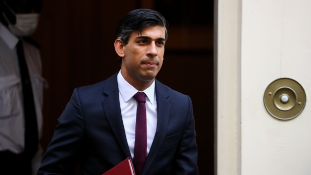 Rishi Sunak, U.K. chancellor of the exchequer, departs number 11 Downing Street on his way to present his 'Winter Economy Plan' at Parliament in London, U.K., on Thursday, Sept. 24, 2020. Sunak will set out a new crisis plan to protect jobs and rescue businesses as the coronavirus outbreak forces the U.K. to return to emergency measures.