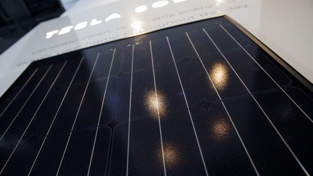 A Tesla Inc. solar panel is displayed during AutoMobility LA ahead of the Los Angeles Auto Show in Los Angeles, California, U.S., on Thursday, Nov. 30, 2017.