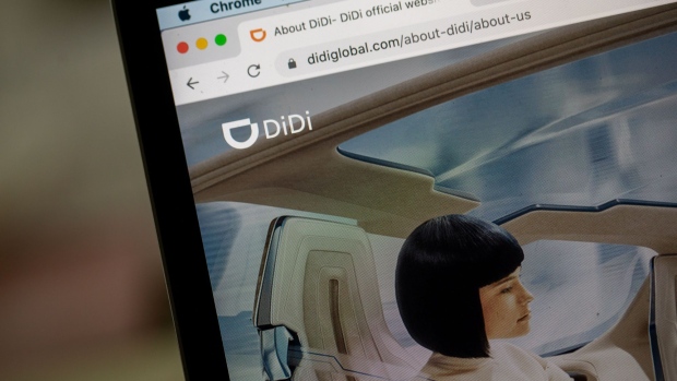 The Didi Global Inc. website on a laptop computer arranged in Hong Kong, China, on Friday, Dec. 3, 2021. Didi has begun preparations to withdraw from U.S. stock exchanges and will start work on a Hong Kong share sale, a stunning reversal as it yields to demands from Chinese regulators that had opposed its American listing.