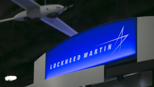 Lockheed Martin Corp. signage is seen on the exhibition floor during the Association for Unmanned Vehicle Systems International (AUVSI) unmanned systems conference in Washington, D.C., U.S., on Tuesday, Aug. 13, 2013. Photographer: Andrew Harrer