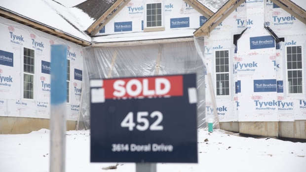 A "Sold" sign is displayed outside a new home under construction at the Toll Brothers Inc. Bowes Creek Country Club community in Elgin, Illinois, U.S., on Thursday, Jan. 23, 2020. The U.S. Census Bureau is scheduled to release housing starts figures on February 19. Photographer: Daniel Acker/Bloomberg
