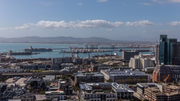 The port area stands beyond commercial high-rise properties in Cape Town, South Africa, on Wednesday, Aug. 19, 2020. The country, which in late March implemented one of the world’s strictest lockdowns to curb the spread of Covid-19, moved to a so-called alert level 2 on Monday, enabling most restricted economic activity to resume. Photographer: Dwayne Senior/Bloomberg
