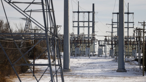 Transmission towers and power lines lead to a substation after a snow storm on February 16, 2021 in Fort Worth, Texas. Photographer: Ron Jenkins/Getty Images North America