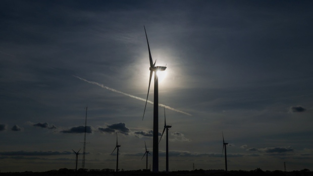 Onshore wind turbines on the Bradwell Wind Farm near Bradwell on Sea, U.K., on Tuesday, Sept. 21, 2021. U.K. Business Secretary Kwasi Kwarteng warned the next few days will be challenging as the energy crisis deepens, and meat producers struggle with a crunch in carbon dioxide supplies.