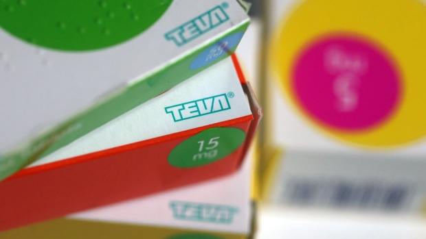 Boxes of tablets, produced by Teva Pharmaceutical Industries Ltd., sit on a pharmacy counter in this arranged photograph in London.