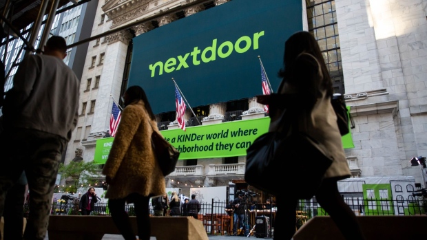 Nextdoor signage in front of the New York Stock Exchange (NYSE) during the company's trading debut in New York, U.S., on Monday, Nov. 8, 2021. Nextdoor Inc., the free social-networking app aimed at connecting local neighborhoods, makes its stock-market debut Monday, capitalizing on its widening appeal during the pandemic. Photographer: Michael Nagle/Bloomberg