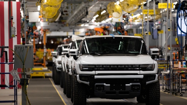 GMC Hummer electric vehicles on the production line at General Motors' Factory ZERO all-electric vehicle assembly plant in Detroit, Michigan, U.S., on Wednesday, Nov. 17, 2021. General Motors invested $2.2 billion in Factory ZERO, the single largest investment in a plant in GM history.