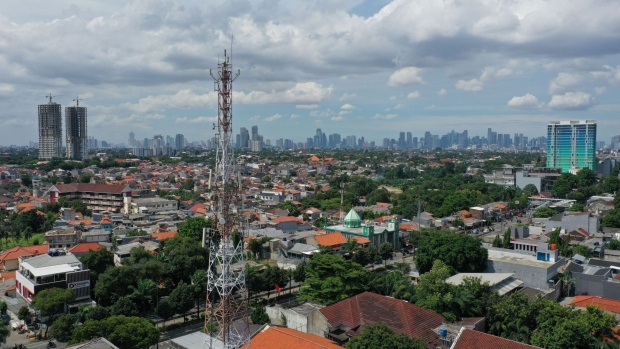 A PT Dayamitra Telekomunikasi telecommunications tower in Jakarta, Indonesia, on Sunday, Nov. 21, 2021. The infrastructure services unit of state-owned PT Telkom Indonesia raised about $1.3 billion in a Jakarta initial public offering, according to people familiar with the matter, making 2021 the country’s biggest IPO year in more than a decade.