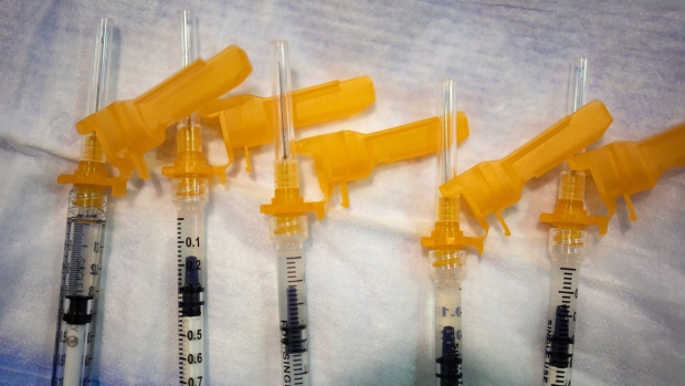 Syringes with doses of the Pfizer-BioNTech Covid-19 pediatric vaccine at a Salvation Army vaccination clinic in Philadelphia, Pennsylvania, U.S., on Friday, Nov. 12, 2021. The Pfizer-BioNTech Covid-19 vaccines for children ages 5 to 11-year-old are a third of the dose that adults receive. Photographer: Hannah Beier/Bloomberg