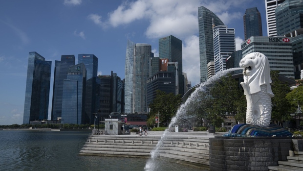 The Merlion Park waterfront stands empty in Singapore, on Tuesday, March 24, 2020. Singapore will deliver a supplementary budget and bring forward its monetary policy decision as authorities ramp up support for an economy heading toward recession. Photographer: Wei Leng Tay/Bloomberg