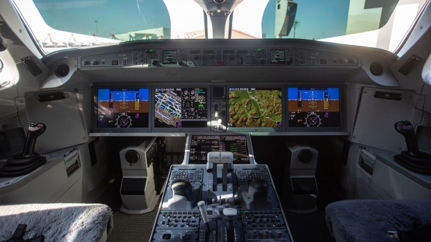 DUBAI, UNITED ARAB EMIRATES - NOVEMBER 14: The cockpit of airBaltics Airbus A220-300 on display at the Dubai Airshow 2021 on November 14, 2021 in Dubai, United Arab Emirates. The Airbus A220-300 is considered the greenest commercial aircraft in the world with 20% less CO2 emissions compared to similar aircrafts. (Photo by Andrea DiCenzo/Getty Images)