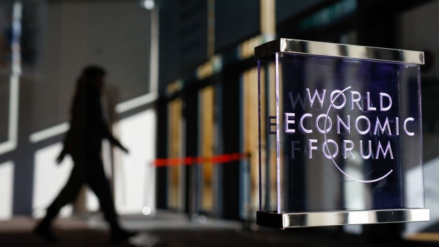 A logo sits on a window at the entrance hall of the Congress Center ahead of the World Economic Forum (WEF) in Davos, Switzerland, on Monday, Jan. 20, 2020. World leaders, influential executives, bankers and policy makers attend the 50th annual meeting of the World Economic Forum in Davos from Jan. 21 - 24.