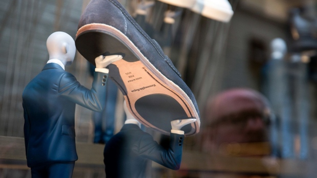 A shoe is displayed in the window of an Ermenegildo Zegna store in Milan.