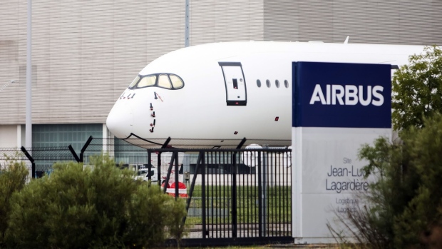 An unbranded Airbus A350 passenger aircraft outside the Airbus SE factory in Toulouse, France, on Wednesday, July 28, 2021. Airbus reports half year earnings on July 29.