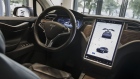 The digital dashboard of a Tesla Motors Inc. Model X electronic vehicle sits on display at the company's showroom in Shanghai, China, on Tuesday, Sept. 12, 2017. China will consider granting foreign investors more access into its electric-vehicle market as the world’s biggest market for battery-powered automobiles comes out with new policy initiatives to give a fillip to the industry.
