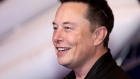 Elon Musk, founder of SpaceX and chief executive officer of Tesla Inc., arrives at the Axel Springer Award ceremony in Berlin, Germany, on Tuesday, Dec. 1, 2020. Tesla Inc. will be added to the S&P 500 Index in one shot on Dec. 21, a move that will ripple through the entire market as money managers adjust their portfolios to make room for shares of the $538 billion company.