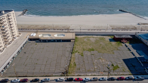 A plot of land owned by Sinclair Haberman, the developer who sued the city over revoking permits to build condominiums overlooking the Atlantic Ocean, in Long Beach, New York, U.S., on Friday, April 23, 2021. Long Beach is known for its raucous West End bars, Irish Day parade and two-mile boardwalk. Locally, the city of 34,000 on a barrier island 25 miles east of New York City, is also renowned for fiscal mismanagement.