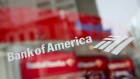 The Bank of America Corp. logo is displayed on the window of a branch in New York.