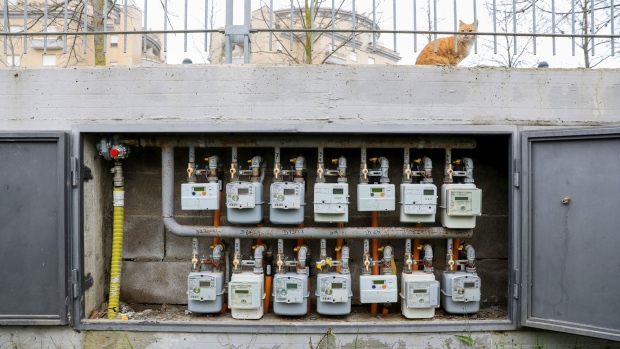 Gas meters outside residential buildings in Rome, Italy, on Tuesday, Dec. 28, 2021. European gas prices declined to near the lowest level in three weeks, with increased inflows at terminals in the region bringing relief to the tight market.