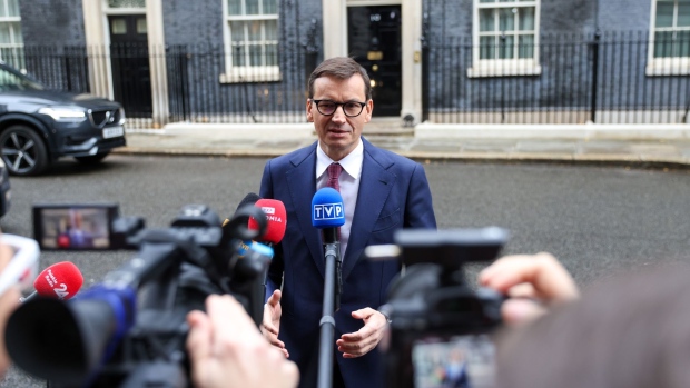 Mateusz Morawiecki, Poland's prime minister, speaks to members of the media as he departs following his bilateral meeting with Boris Johnson, U.K. prime minister, at number 10 Downing Street in London, U.K., on Friday, Nov. 26, 2021. Poland will temporarily cut taxes on household energy bills in a bid to help the central bank stem surging inflation that has become a major concern for the nationalist ruling party’s electorate.