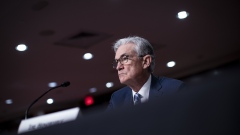 Jerome Powell, chairman of the U.S. Federal Reserve, during a Senate Banking, Housing and Urban Affairs Committee hearing in Washington, D.C., U.S., on Tuesday, Nov. 30, 2021. The Federal Reserve chair, in his first public remarks on the omicron variant of the coronavirus, said it poses risks to both sides of the central bank's mandate to achieve stable prices and maximum employment. Photographer: Al Drago/Bloomberg