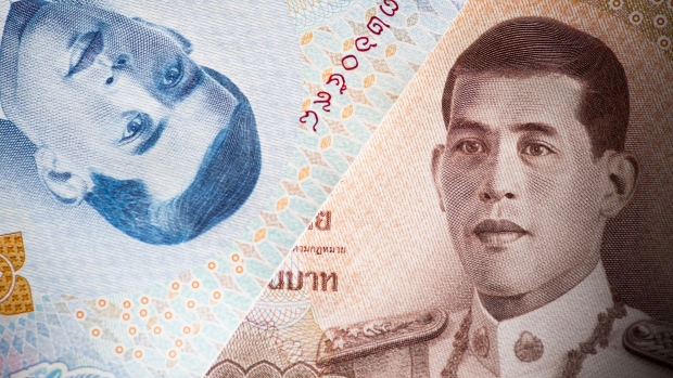 The portrait of Thai King Maha Vajiralongkorn is displayed on 50, left, and 1,000 baht banknotes in an arranged photograph in Bangkok, Thailand, on Wednesday, Sept. 12, 2018. The baht has been a stand-out currency amid the recent rout in emerging markets. It's appreciated 1.5 percent against the dollar so far this quarter, the best performer among major Asian currencies and the only gainer among them. Photographer: Brent Lewin/Bloomberg