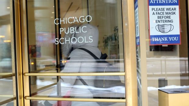 CHICAGO, ILLINOIS - JANUARY 05: A sign is displayed at the entrance of the headquarters for Chicago Public Schools on January 05, 2022 in Chicago, Illinois. Classes at all of Chicago public schools have been canceled today by the school district after the teacher's union voted to return to virtual learning citing unsafe conditions in the schools as the Omicron variant of the COVID-19 virus continues to spread. (Photo by Scott Olson/Getty Images)