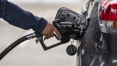 A customer refuels a car at a gas station in San Francisco, California, U.S., on Thursday, Oct. 21, 2021. American drivers will continue to face historically high fuel prices as gasoline demand surged to the highest in more than a decade.